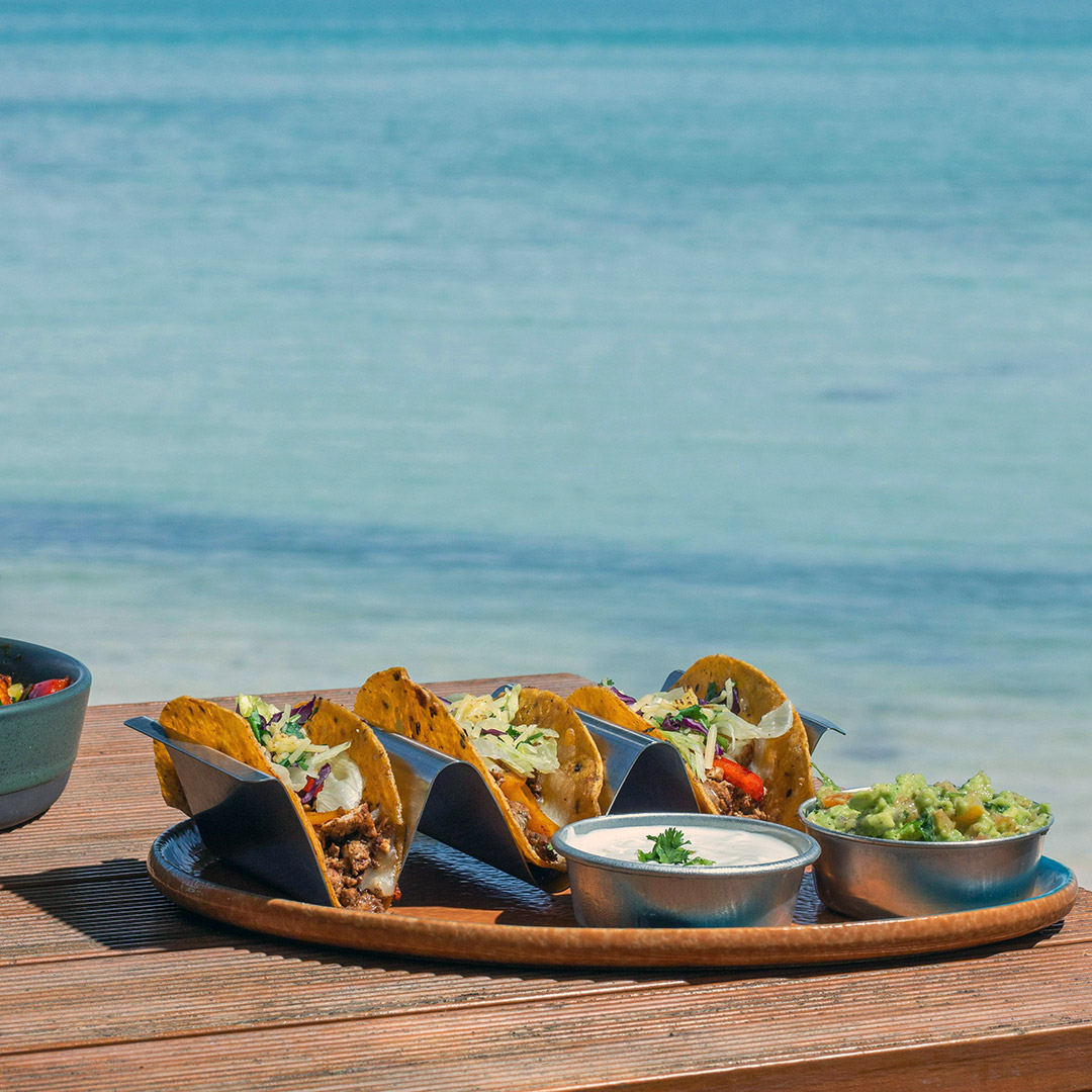 Por qué la comida sabe mejor frente al mar