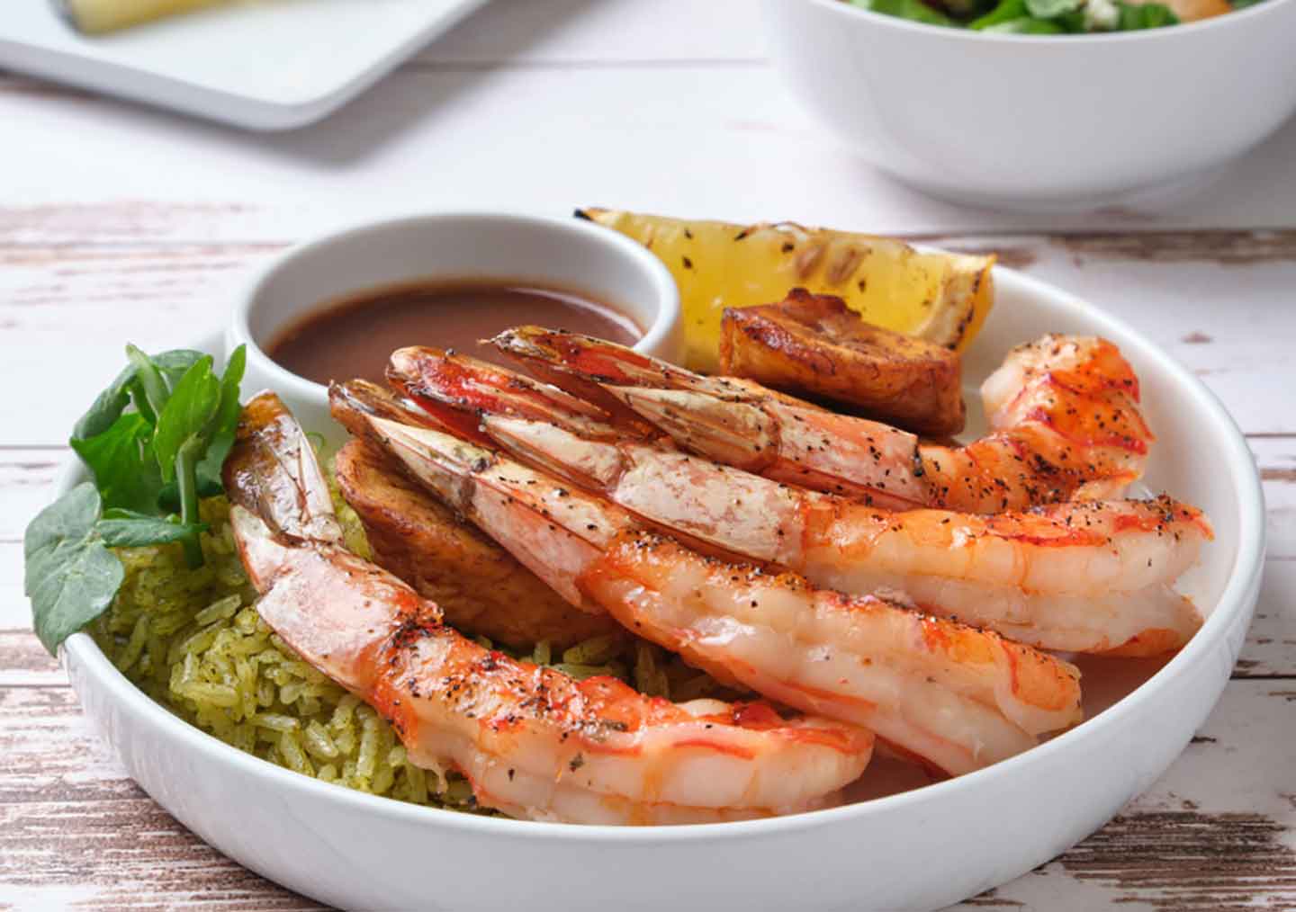 Camarones salteados con salsa de tequila y tamarindo.